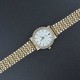 Crystal Rim Steel Strap Wrist Watch For Women's - Gold image