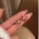  Glamorous Gold Claw-Shaped Stud Earrings with Rhinestones image