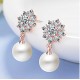 Rose Gold Snowflake Earrings With Zirconia And Simulated Pearls image