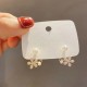Elegant Gold Flower Earrings With Delicate Pearls image