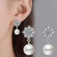 Silver Snowflake Earrings With Zirconia And Simulated Pearls image